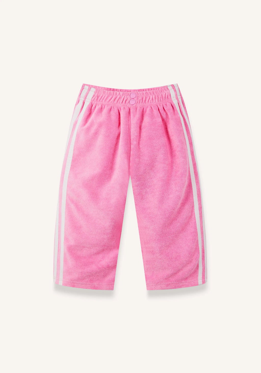 Pink knit pants with white side stripes, featuring an elastic waistband and a snap button closure, shown against a light cream background.